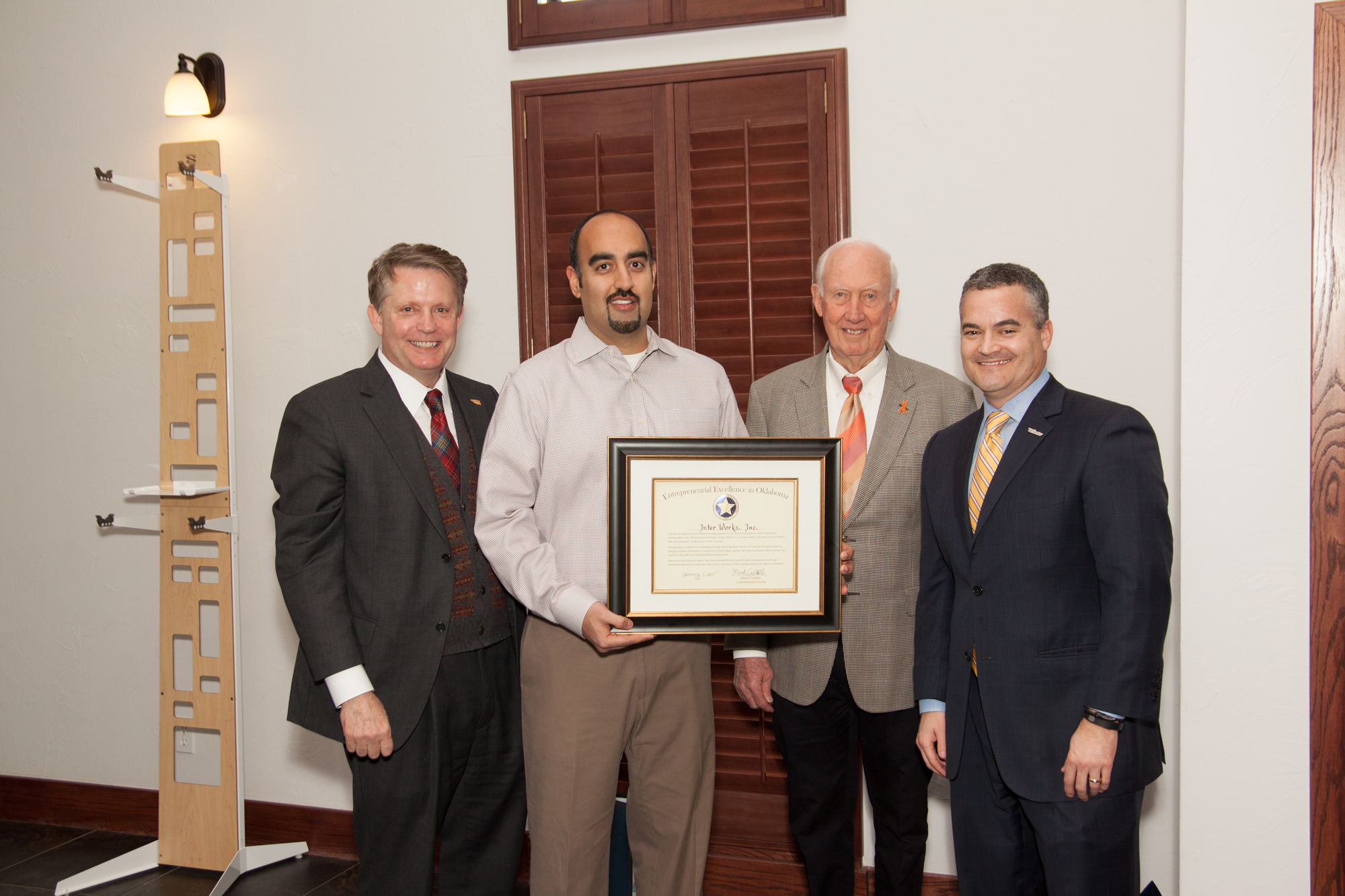 Behfar receiving the award